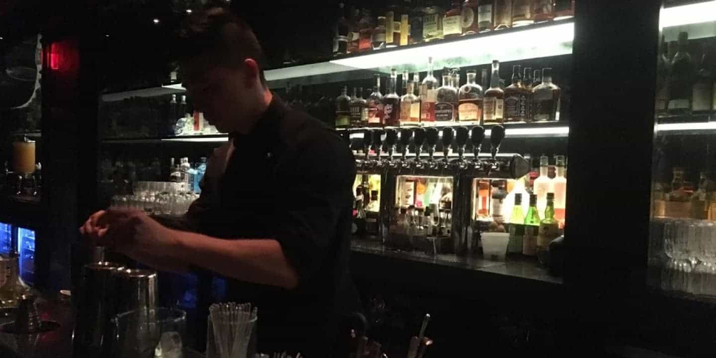 joseph crafting cocktails at prohibition at rosewood hotel georgia